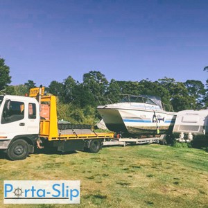 Porta-Slip-Boat-Transport-Company-dropping-a-boat-off-onto-a-property-for-storing-on-a-mobile-slip-cradle
